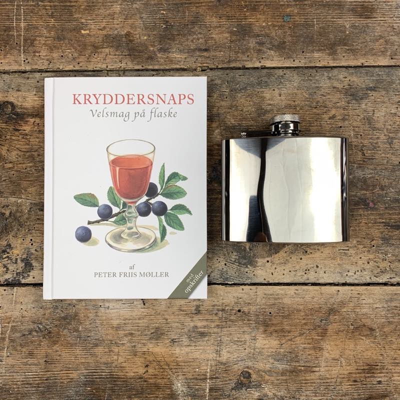 Sett med boken 'Kryddersnaps - Velsmak på flaske' og Lommelærke